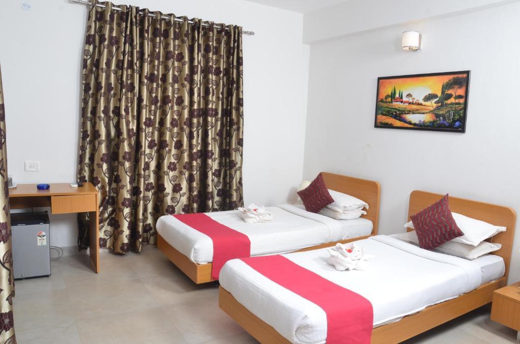 Hotel Sunkissed Plaza Calangute Habitación foto